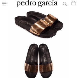 Pedro Garcia slides gold “mirrors” & black soles